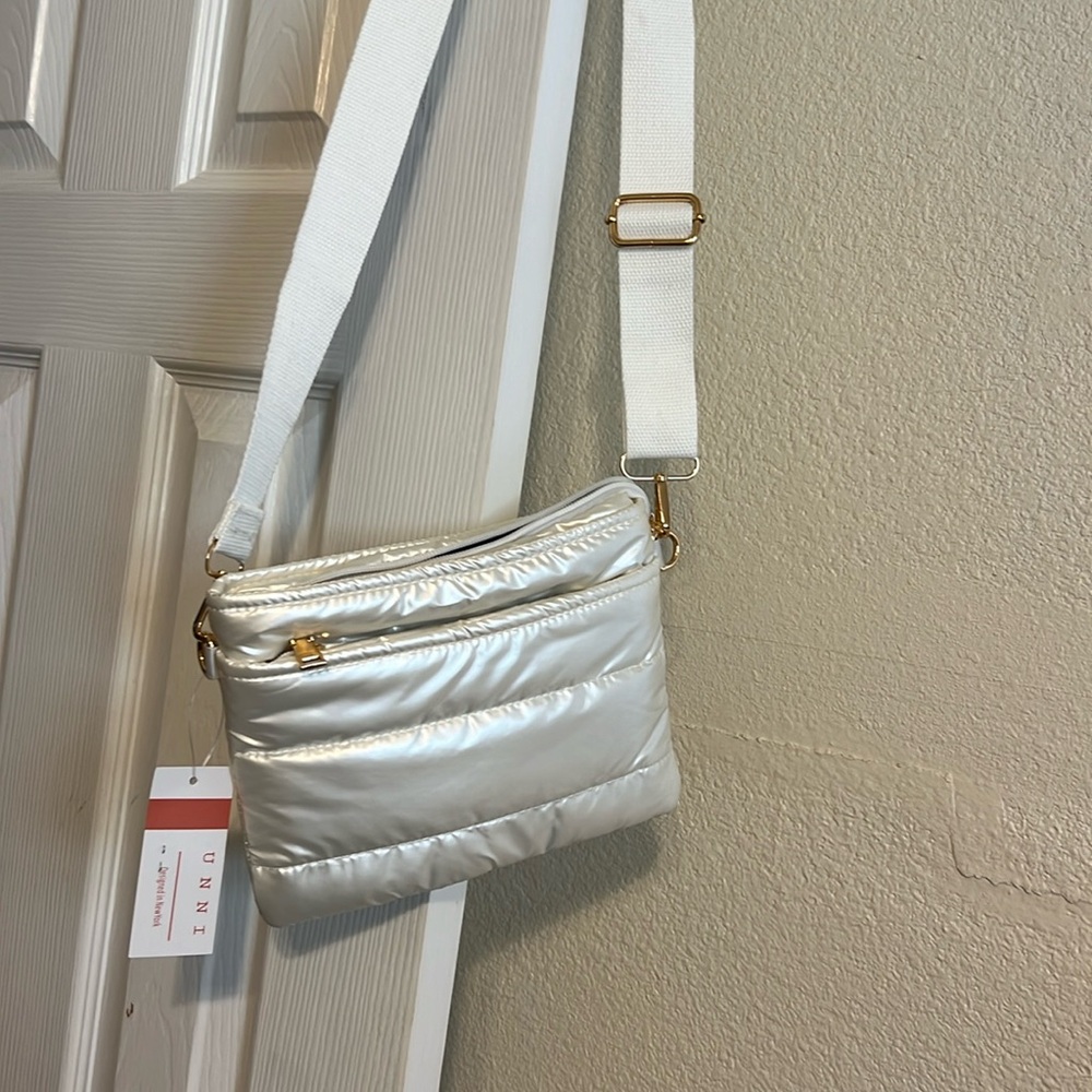 White shiny cross body